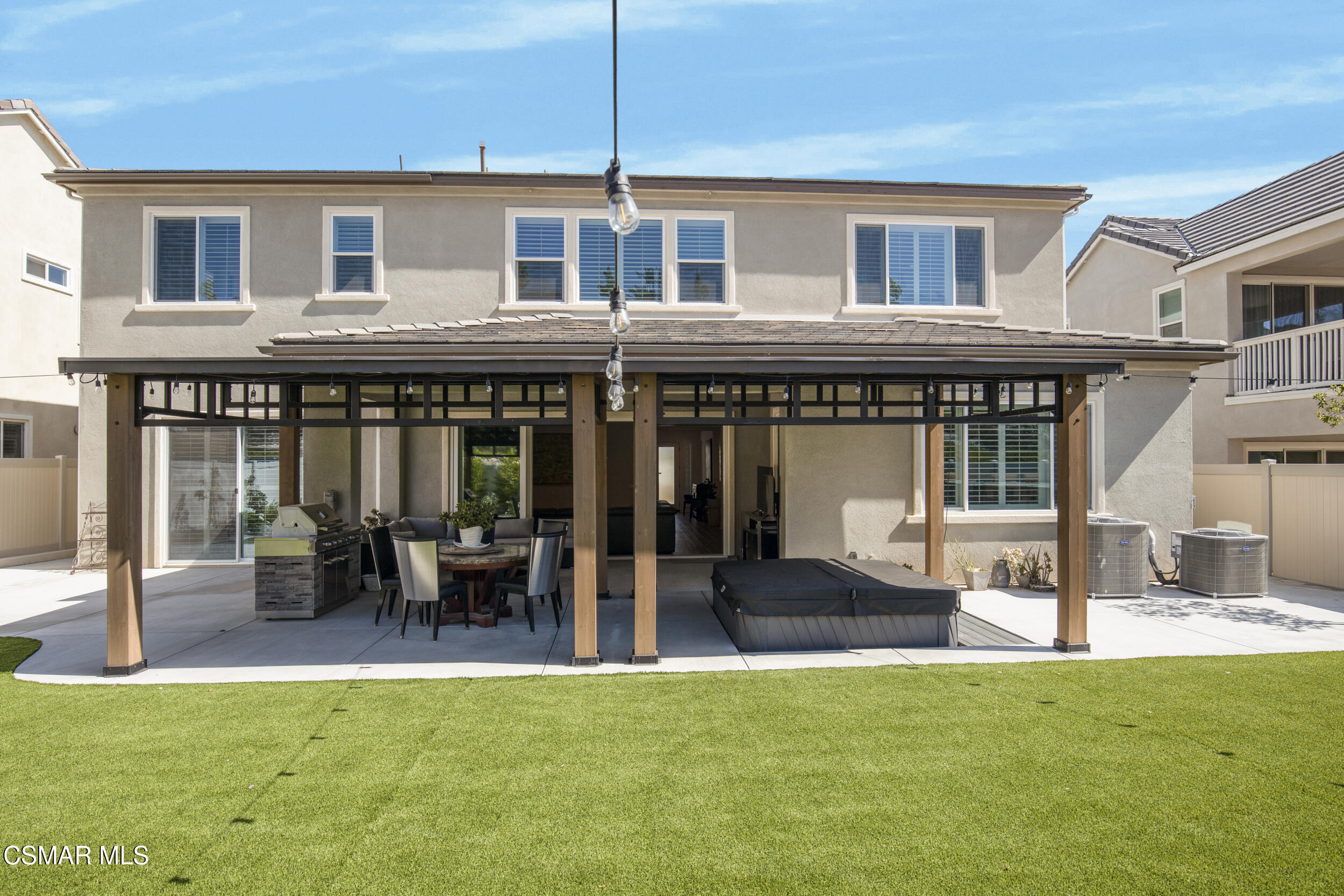 28665 Windbreak Trail Saugus, CA 91350 - Photo 33 of 56 a front view of a house with a patio