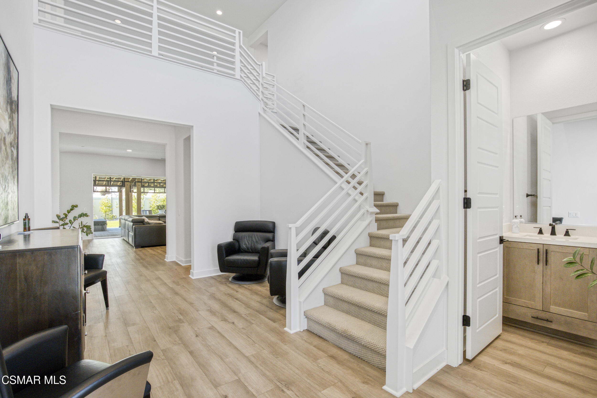 28665 Windbreak Trail Saugus, CA 91350 - Photo 4 of 56 a view of entryway and hall with wooden floor