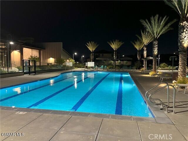 28665 Windbreak Trail Saugus, CA 91350 - Photo 45 of 56 a view of a swimming pool with lounge chairs