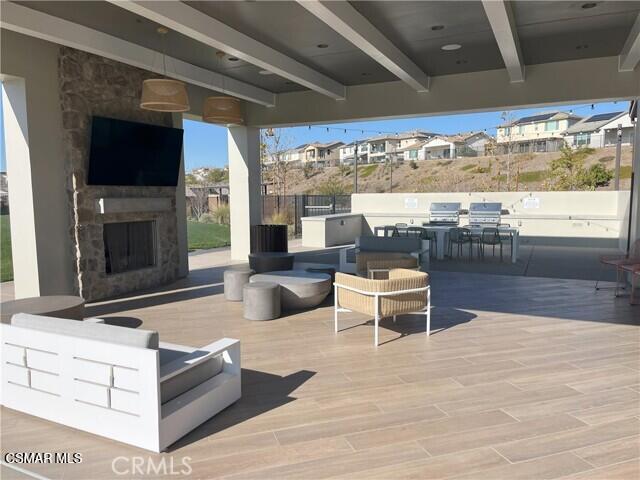 28665 Windbreak Trail Saugus, CA 91350 - Photo 49 of 56 a living room with furniture and a fireplace