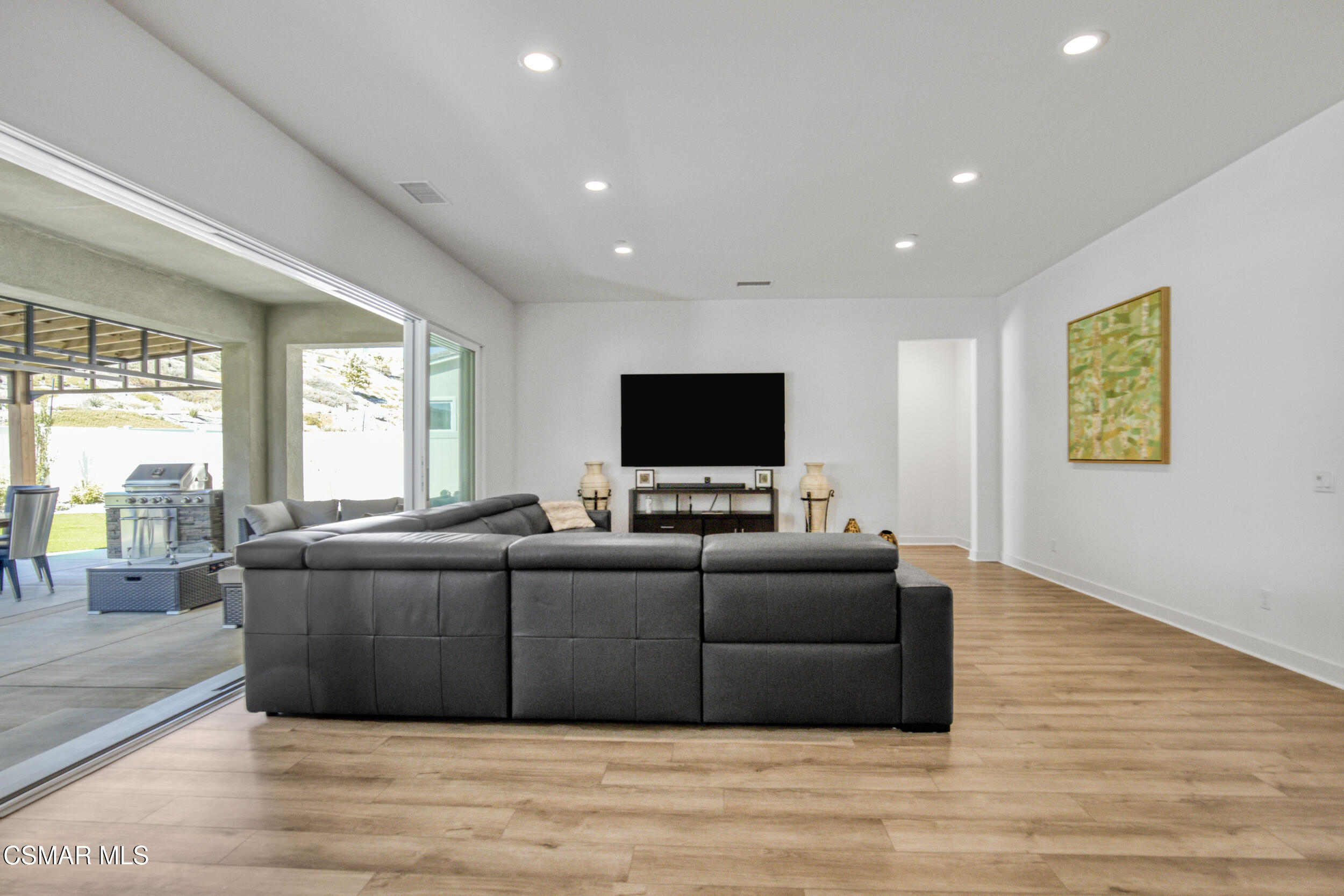 28665 Windbreak Trail Saugus, CA 91350 - Photo 10 of 56 a living room with furniture window and a flat screen tv