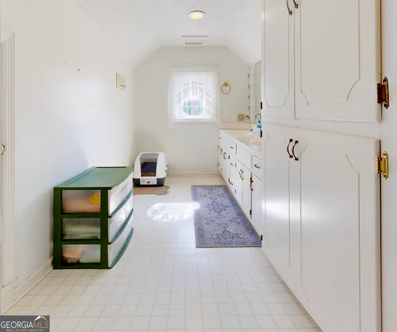 a bedroom with a bed and a closet