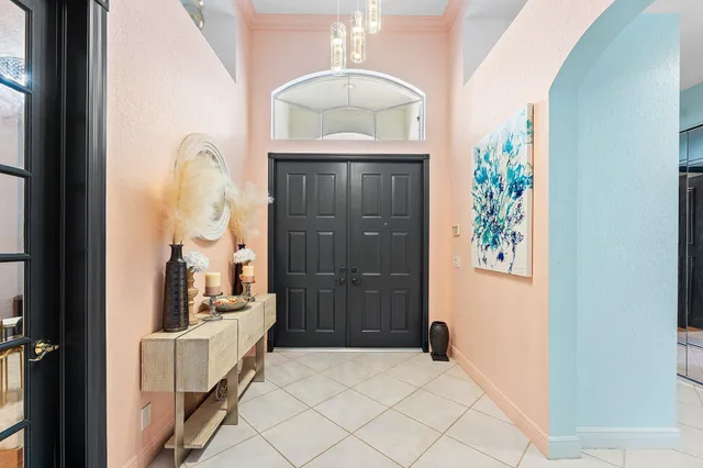 a bathroom with a toilet a sink and a mirror
