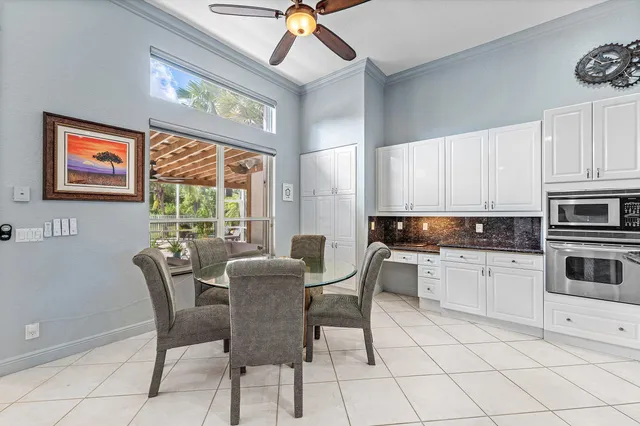 a spacious bedroom with a bed and a large window