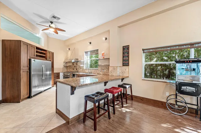 a backyard of a house with seating space