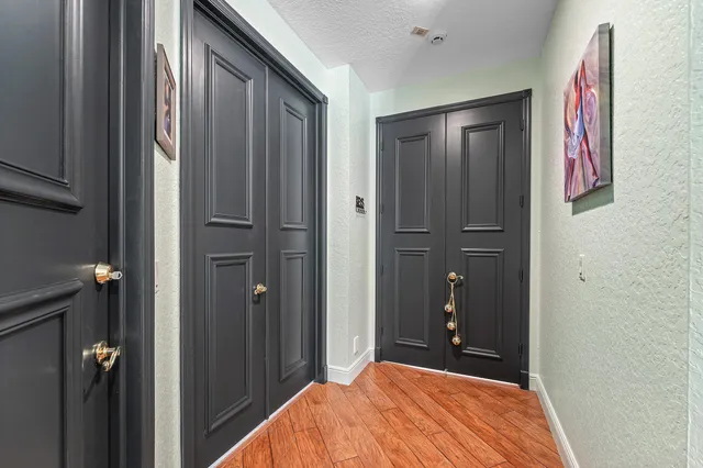 a view of a house with swimming pool and sitting area