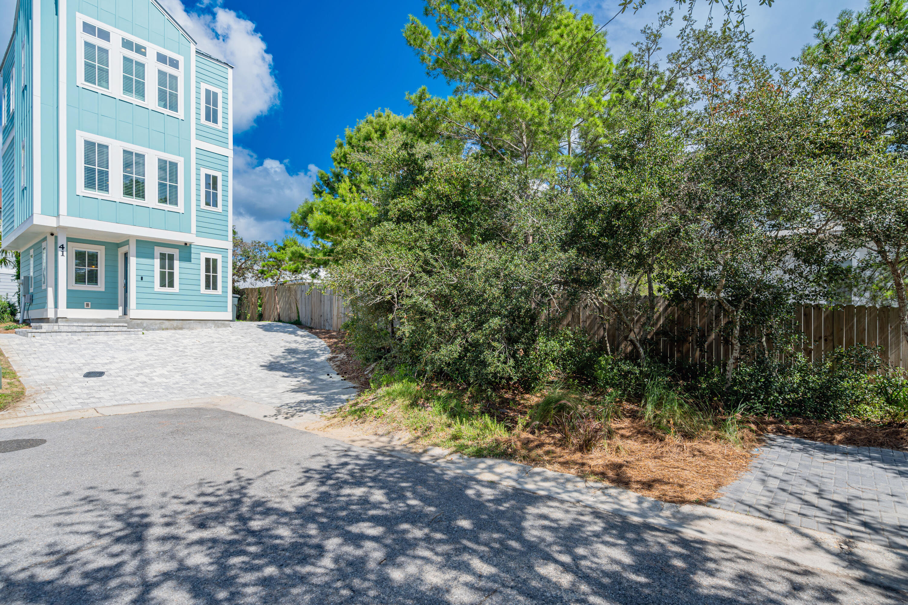 41 Abbie Road Santa Rosa Beach, FL 32459 - Photo 3 of 38 a view of a street with a building in the background
