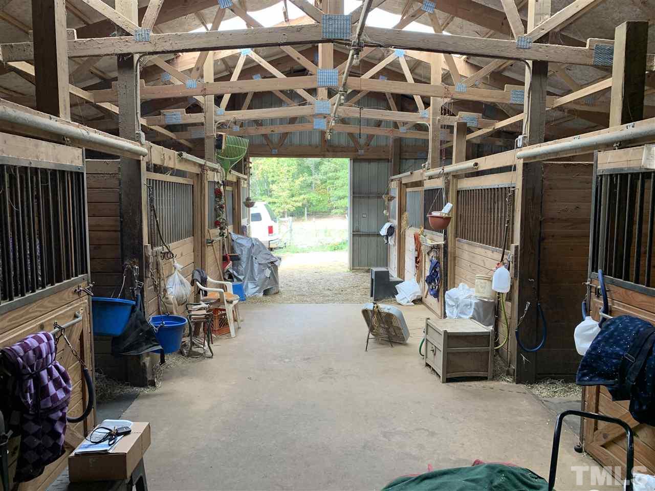 2425 Emerson Cook Road Pittsboro, NC 27312 - Photo 2 of 10 a view of a room with gym equipment