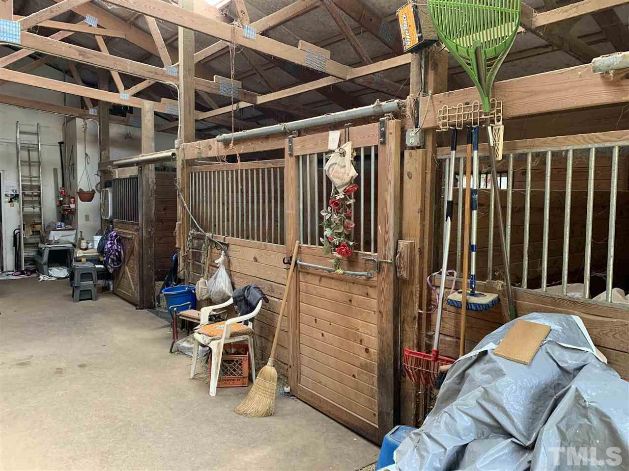2425 Emerson Cook Road Pittsboro, NC 27312 - Photo 5 of 10 a view of a room with gym equipment