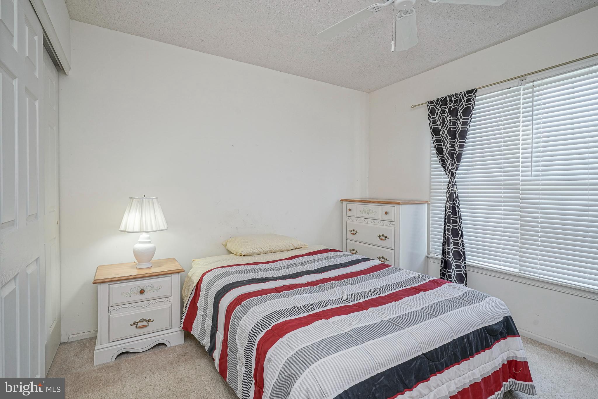160 Gunwale Road Manahawkin, NJ 08050 - Photo 17 of 27 a bedroom with a bed and a closet