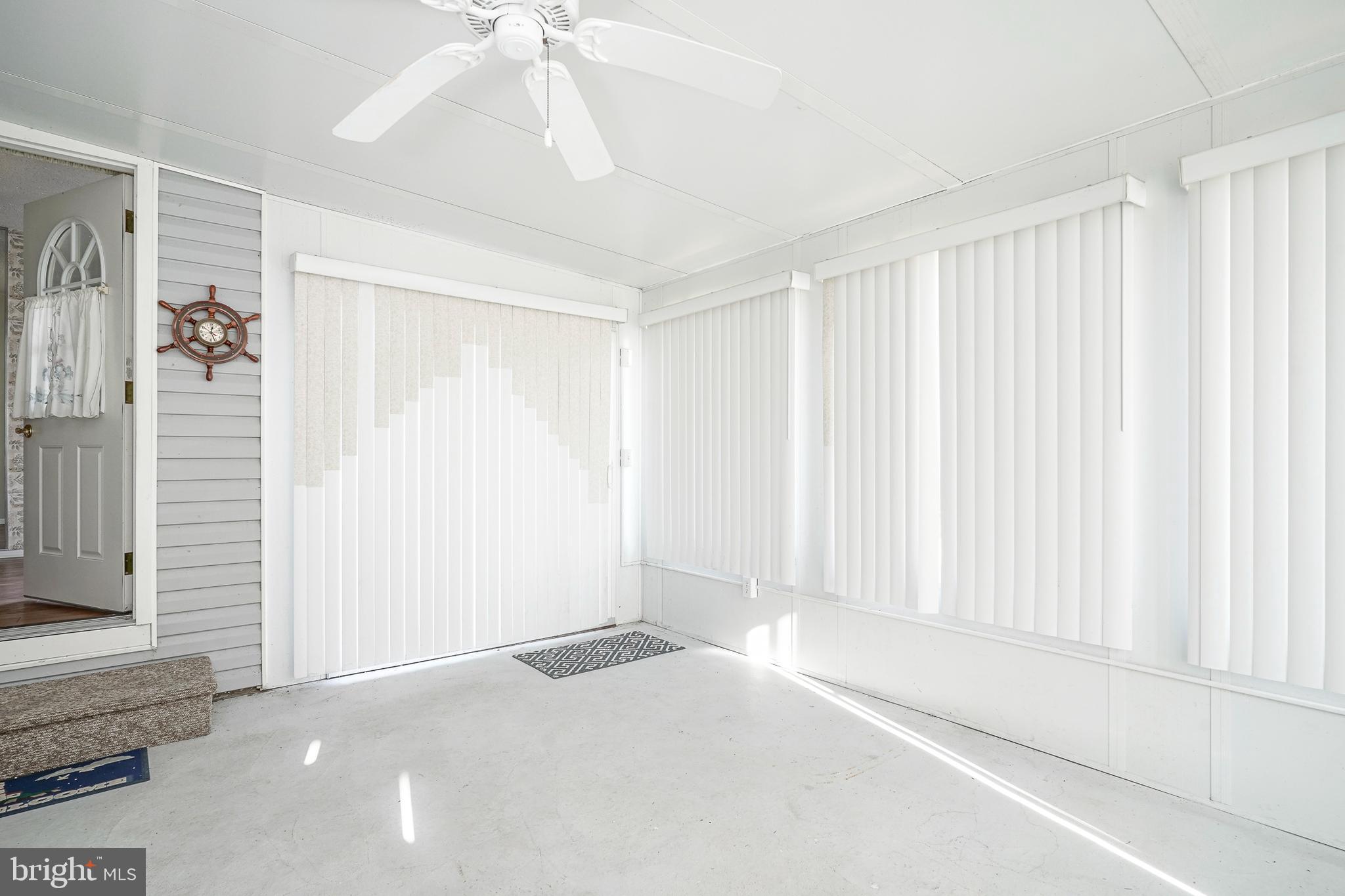 160 Gunwale Road Manahawkin, NJ 08050 - Photo 23 of 27 a view of a room with a window and a ceiling fan