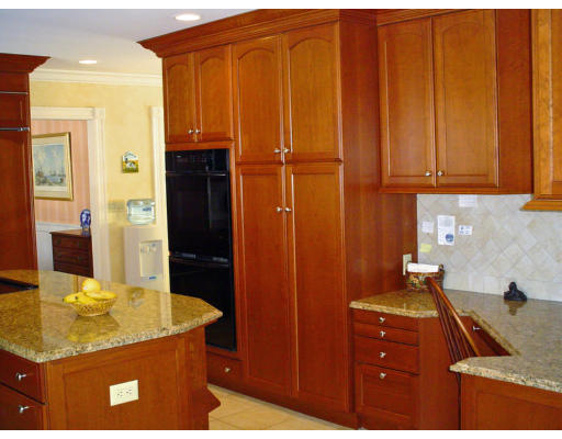 53 White Oak Road Wellesley, MA 02481 - Photo 3 of 9 a bathroom with a granite countertop sink and a mirror