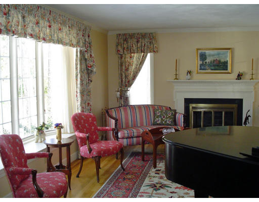 53 White Oak Road Wellesley, MA 02481 - Photo 4 of 9 a living room with furniture a window and a fireplace