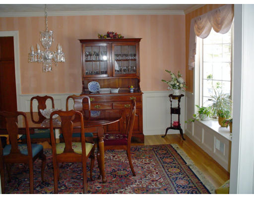 53 White Oak Road Wellesley, MA 02481 - Photo 7 of 9 a view of a dining room with furniture window and outside view
