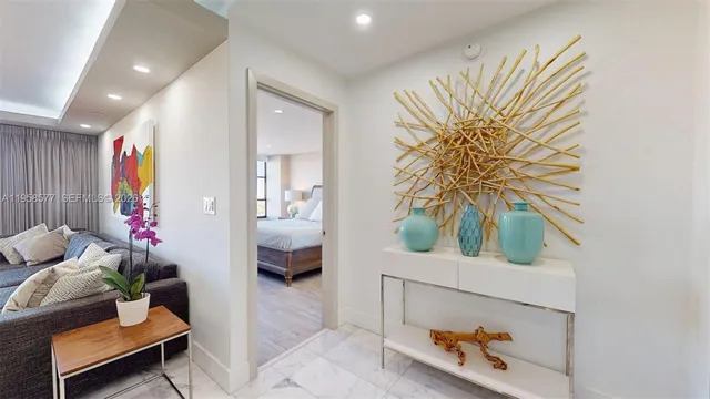 a bedroom with a bed and a lamp