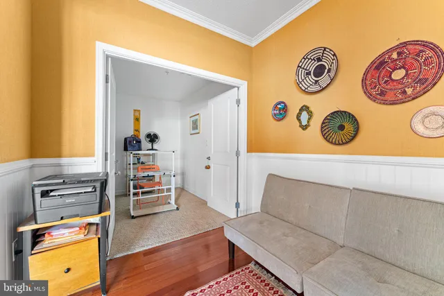 view of living room with furniture and book shelf