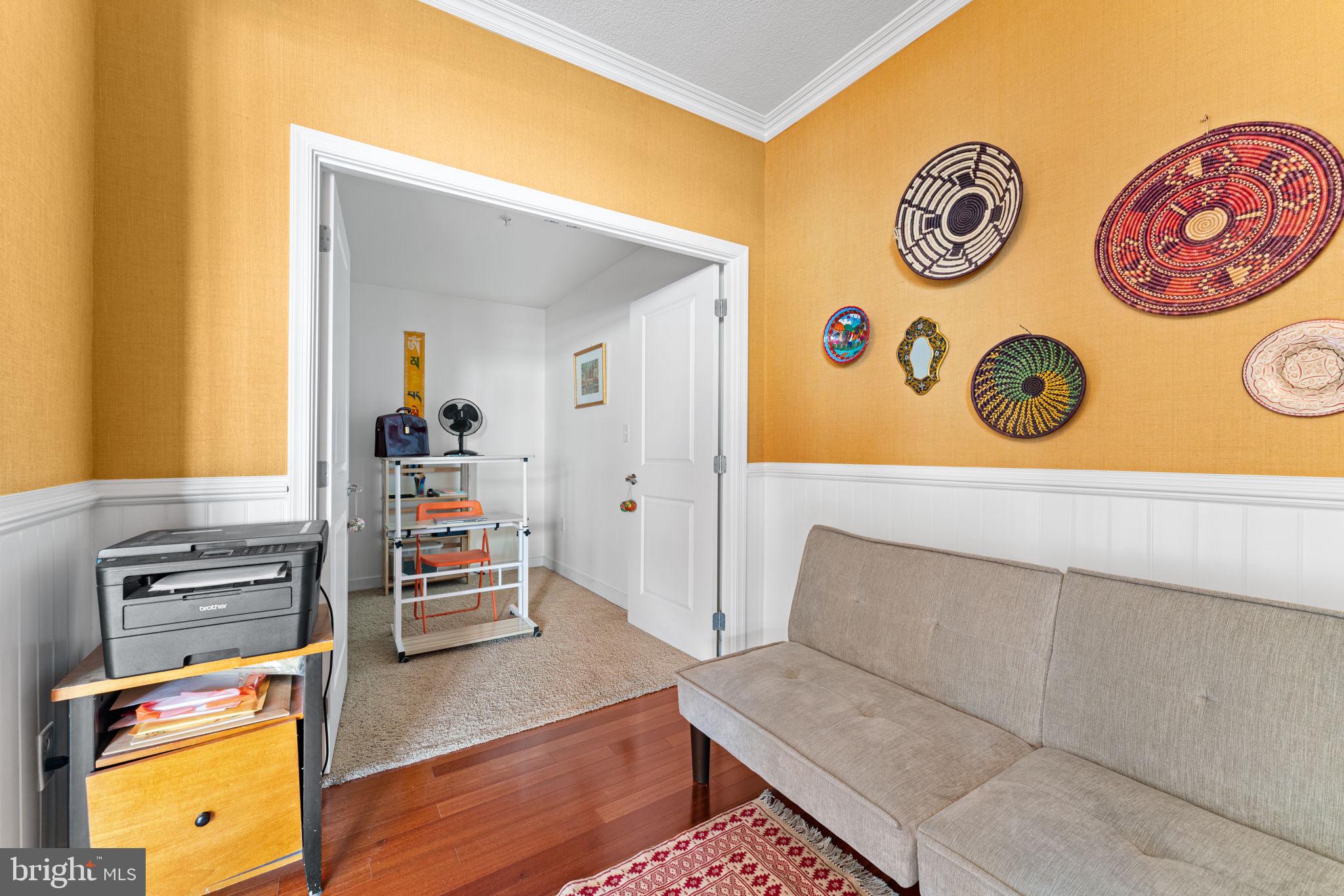 157 Fleet Street, Unit 1001 Oxon Hill, MD 20745 - Photo 12 of 24 view of living room with furniture and book shelf