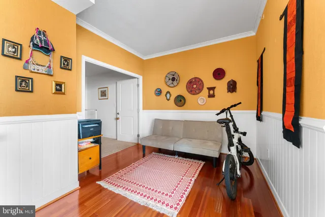 a living room with a couch and a table