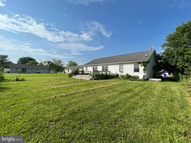 a front view of house with yard
