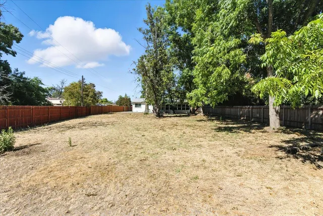 a view of a pathway of a building from a balcony