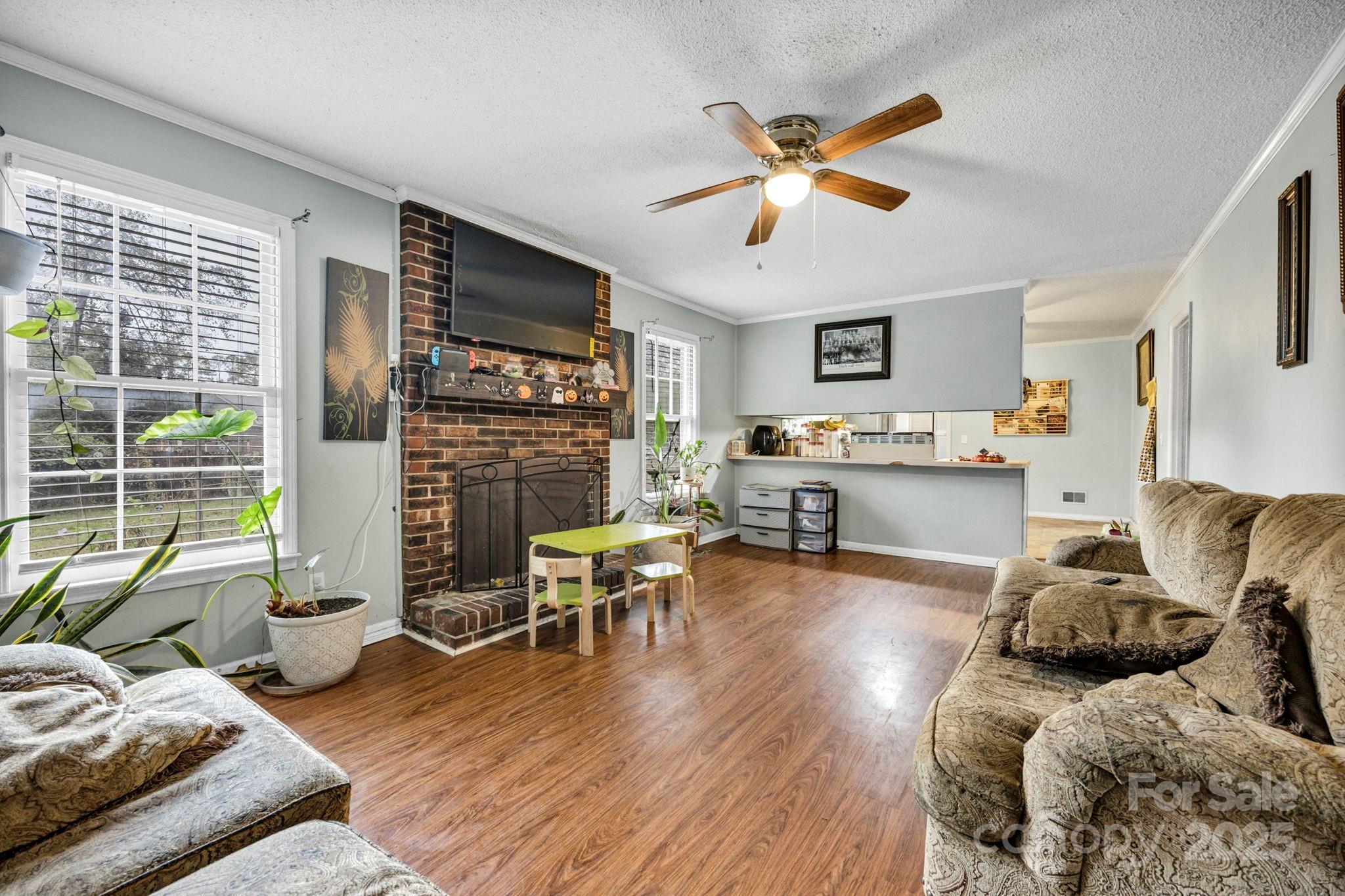 403 Ravenscroft Road West Columbia, SC 29172 - Photo 12 of 33 a living room with furniture and a fireplace