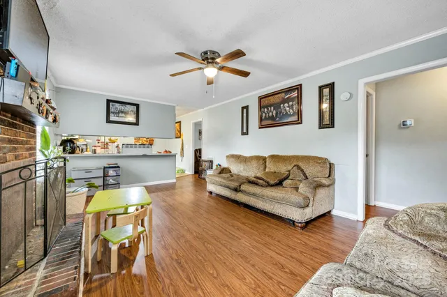 a bedroom that has a bed and a desk