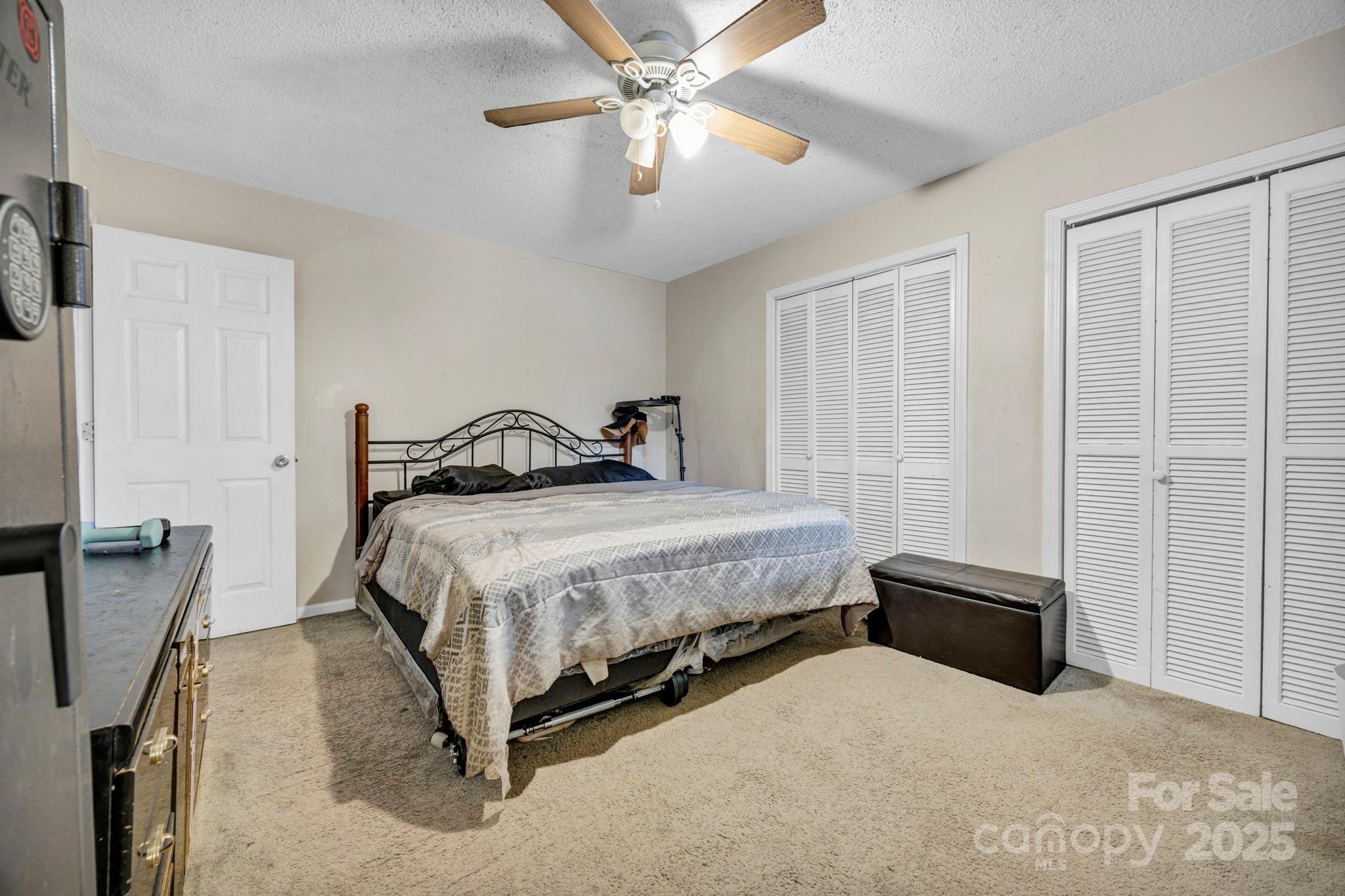 403 Ravenscroft Road West Columbia, SC 29172 - Photo 18 of 33 a bedroom with a bed and ceiling fan