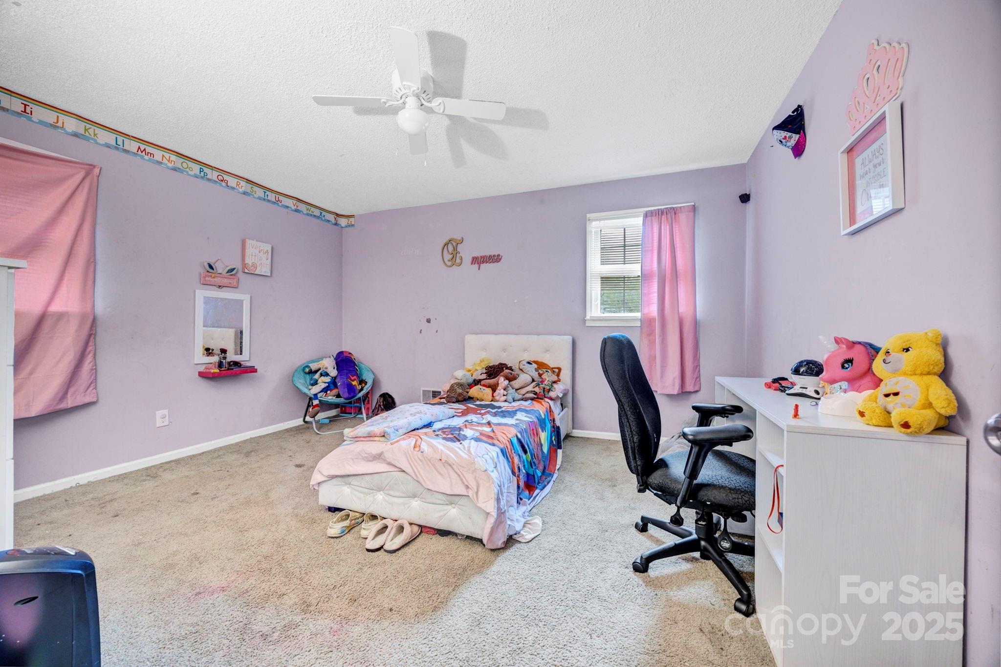 403 Ravenscroft Road West Columbia, SC 29172 - Photo 21 of 33 a bedroom with furniture and a chandelier fan