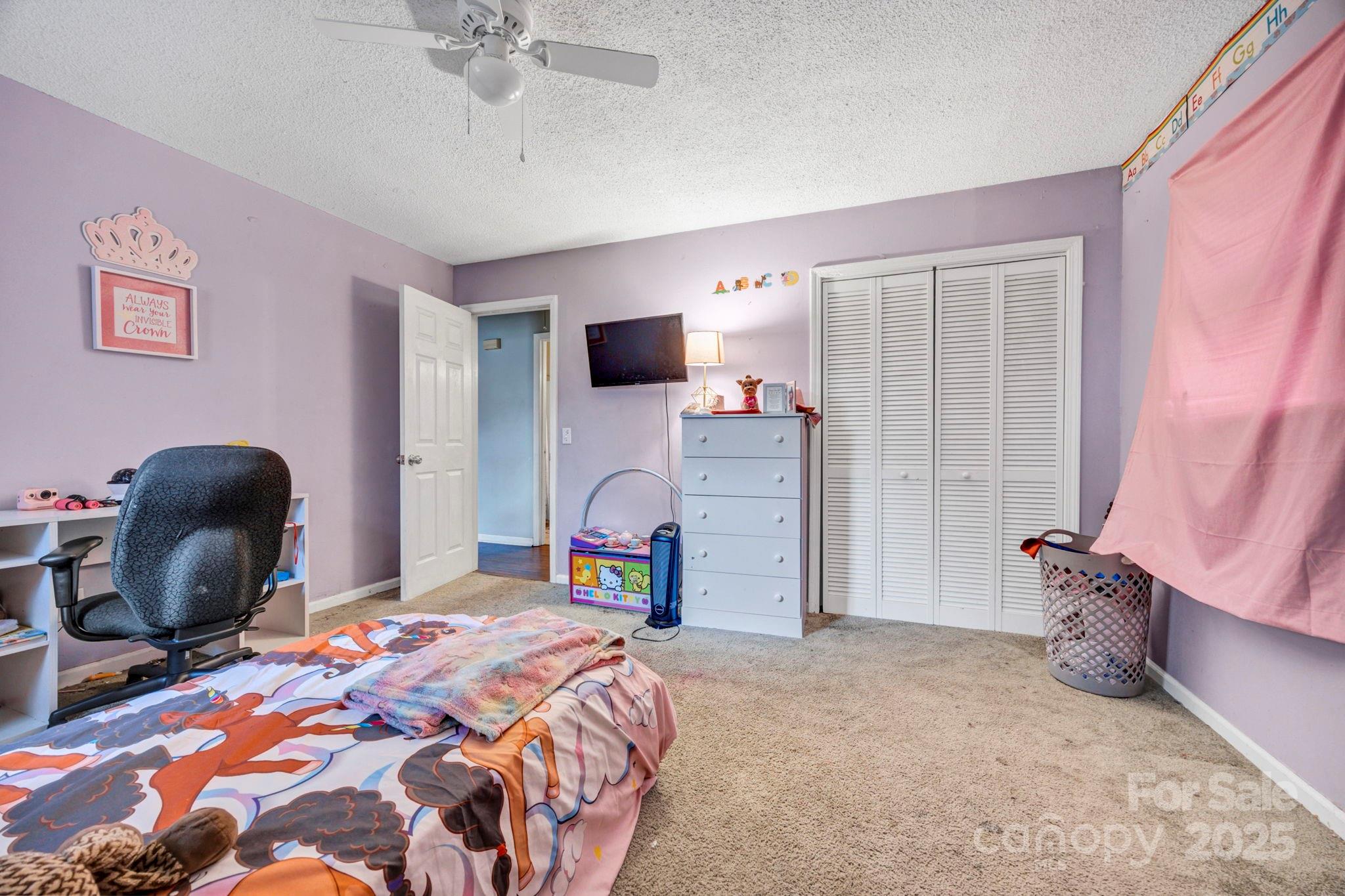 403 Ravenscroft Road West Columbia, SC 29172 - Photo 22 of 33 a bedroom with a bed and a television