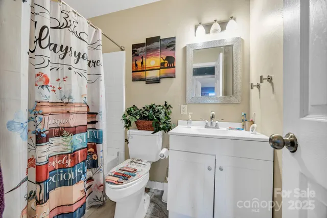 a view of a backyard with table and chairs