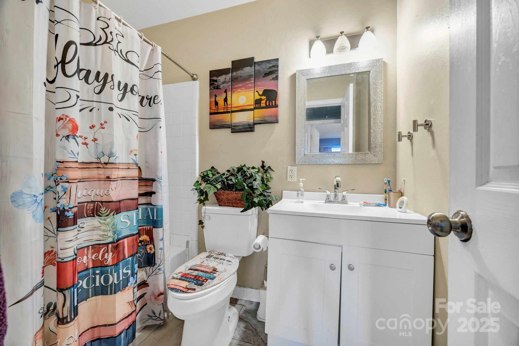 403 Ravenscroft Road West Columbia, SC 29172 - Photo 23 of 33 a bathroom with a sink and a mirror