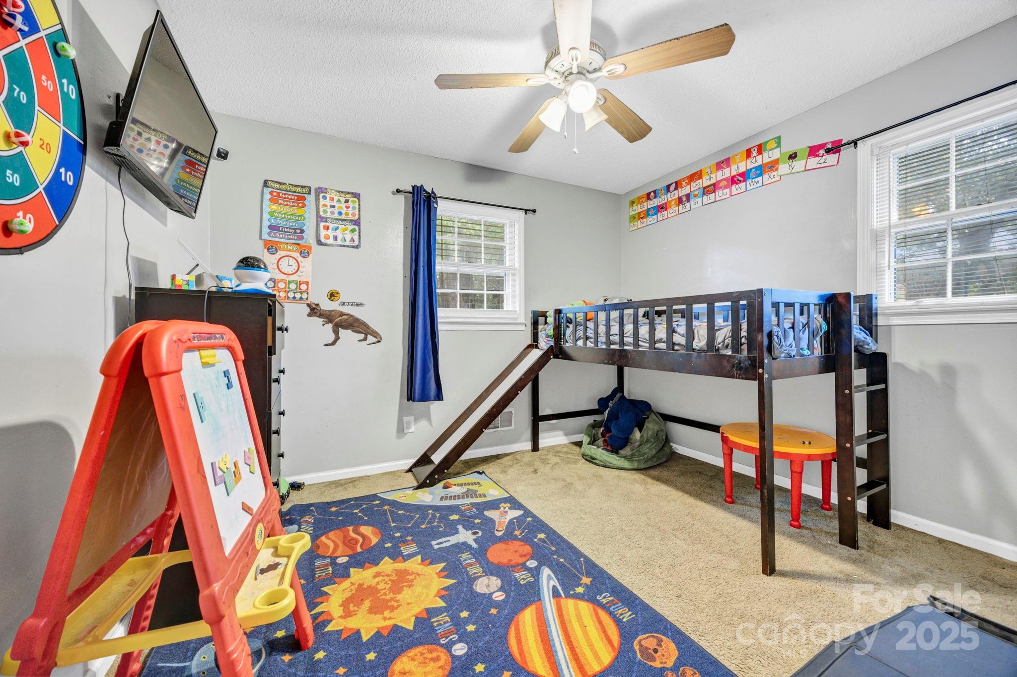 403 Ravenscroft Road West Columbia, SC 29172 - Photo 24 of 33 a bedroom with furniture and a chandelier fan
