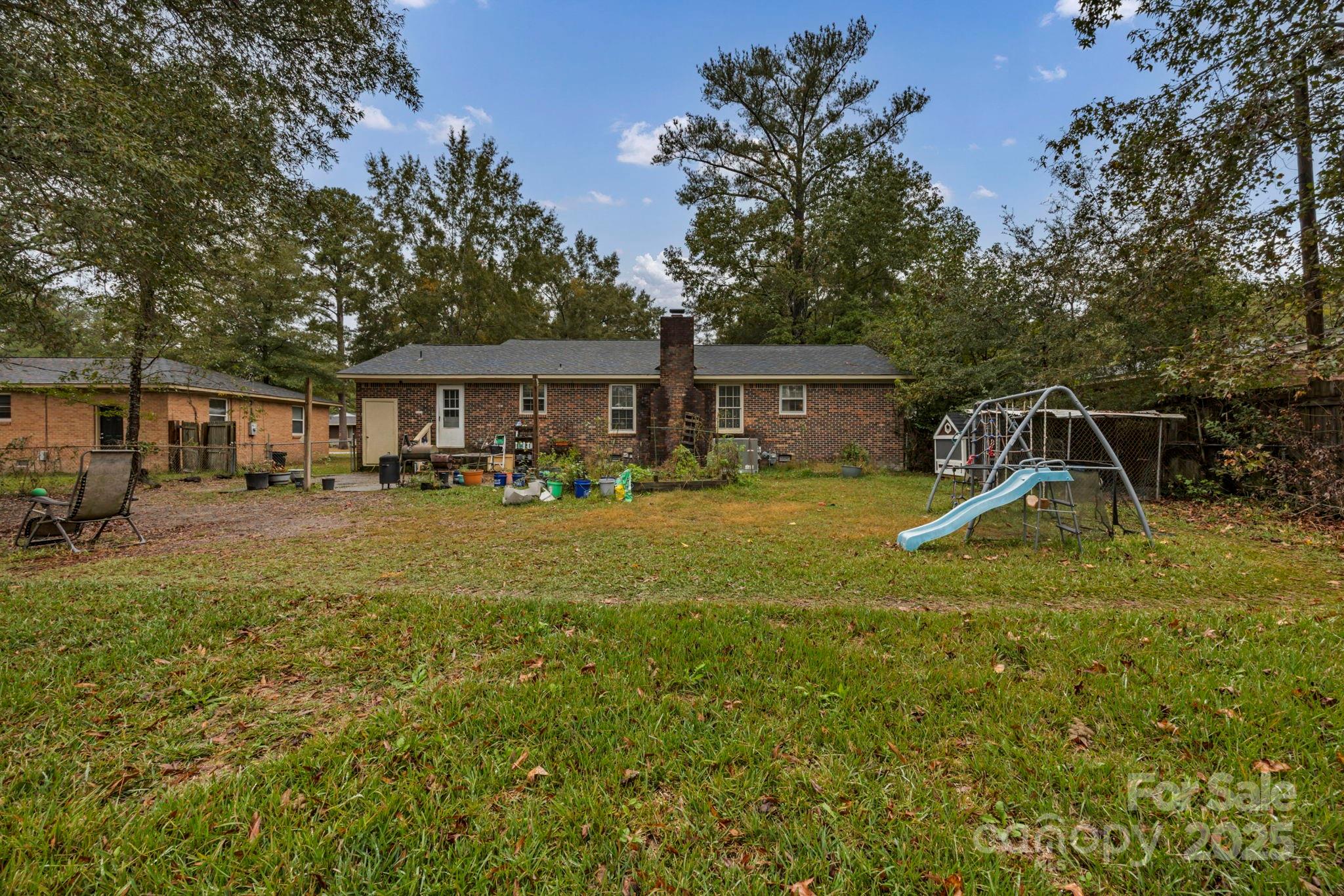403 Ravenscroft Road West Columbia, SC 29172 - Photo 30 of 33 a view of a house with swimming pool