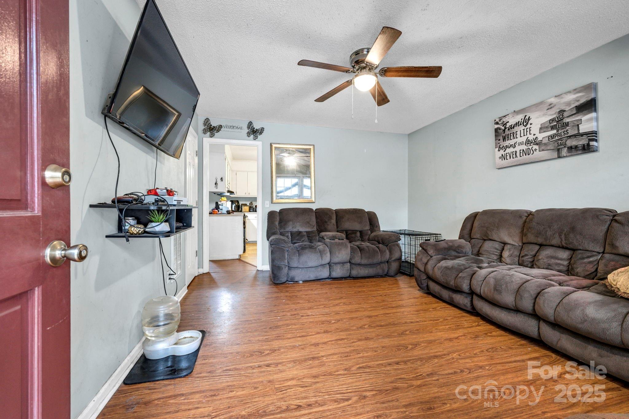 403 Ravenscroft Road West Columbia, SC 29172 - Photo 3 of 33 a living room with furniture ceiling fan and a wooden floor