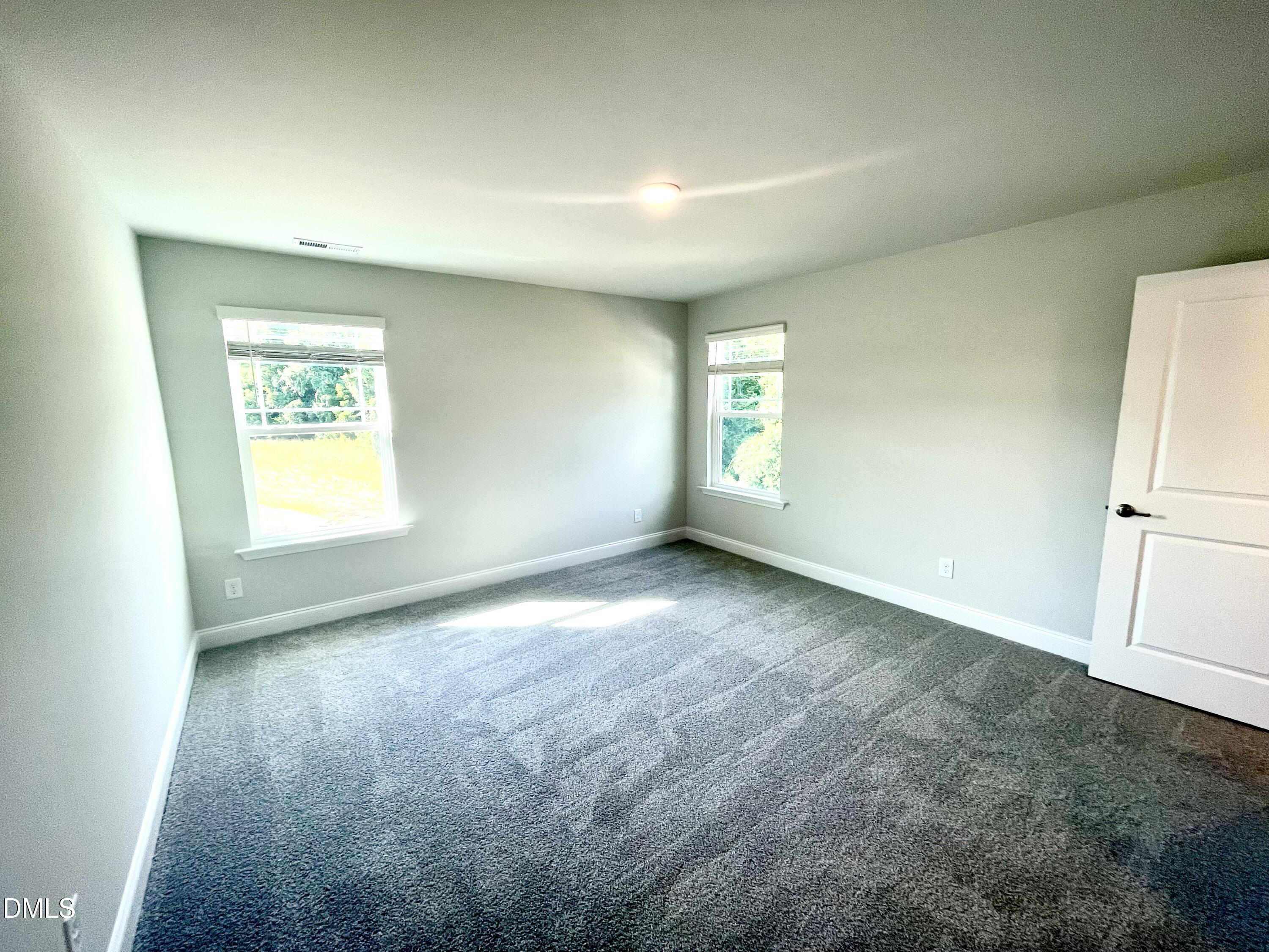 39 Deep Blue Trail Middlesex, NC 27557 - Photo 25 of 37 an empty room with windows