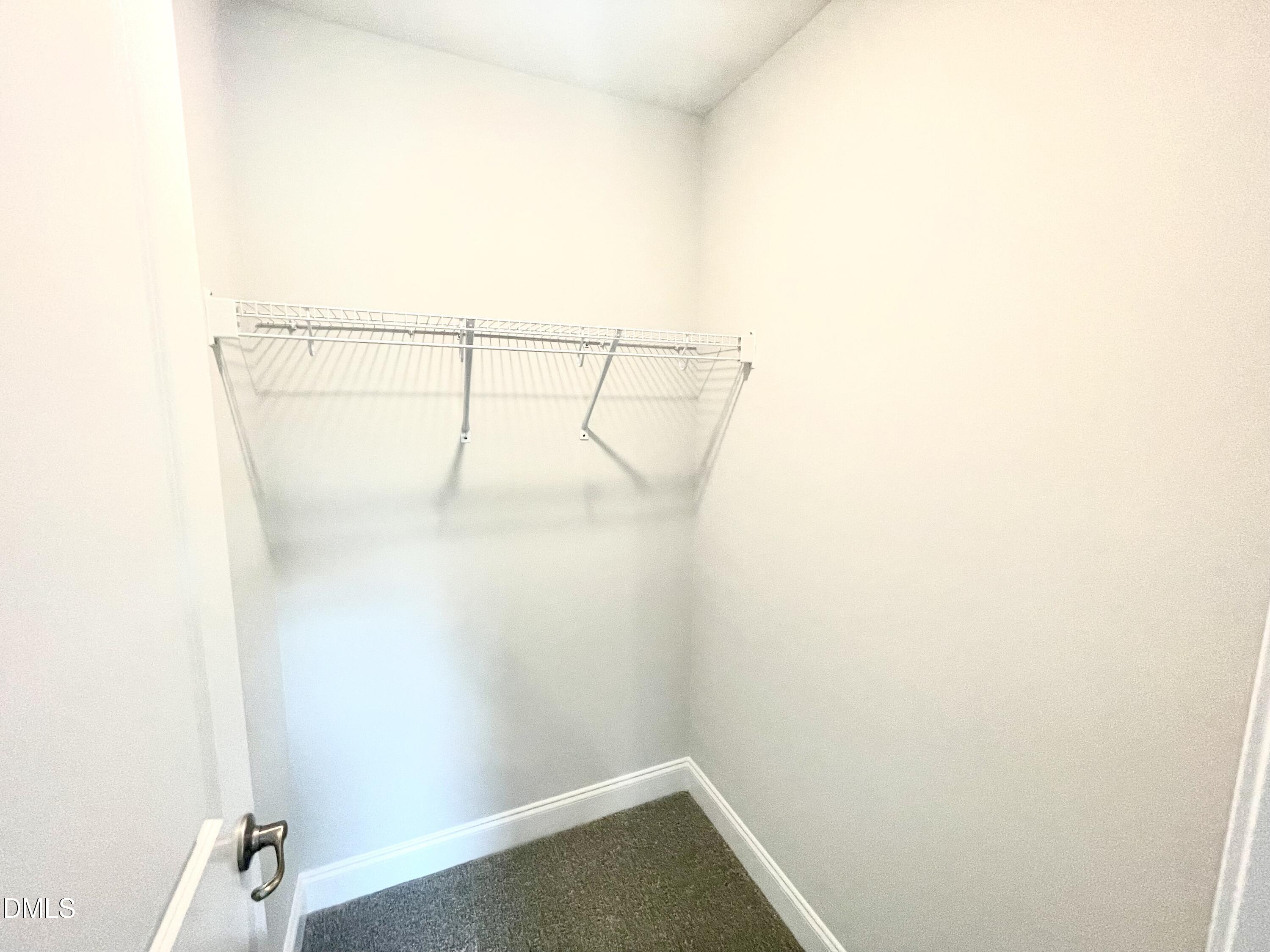 39 Deep Blue Trail Middlesex, NC 27557 - Photo 27 of 37 a view of small space with racks on the wall