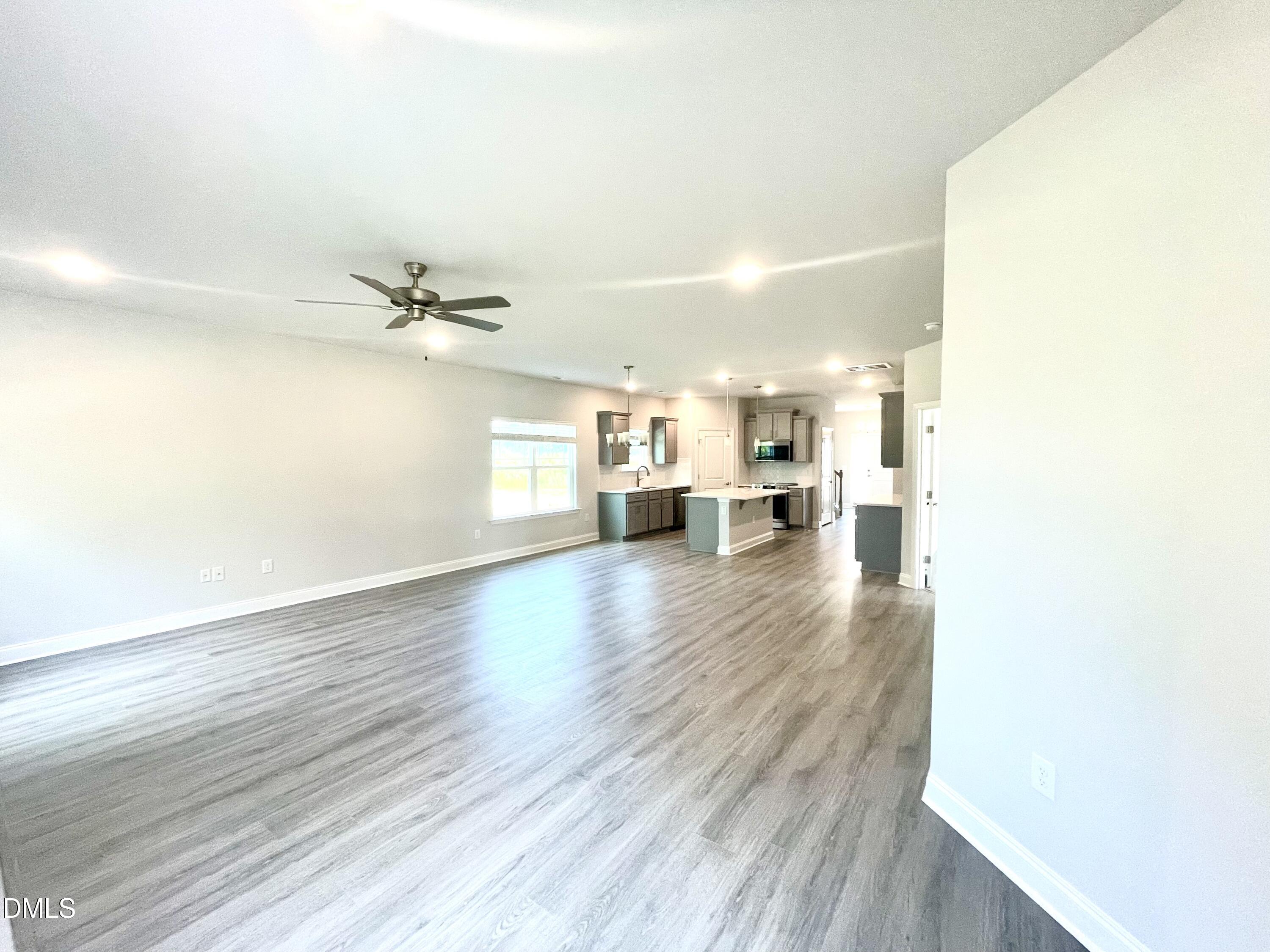 39 Deep Blue Trail Middlesex, NC 27557 - Photo 6 of 37 a view of empty room with wooden floor