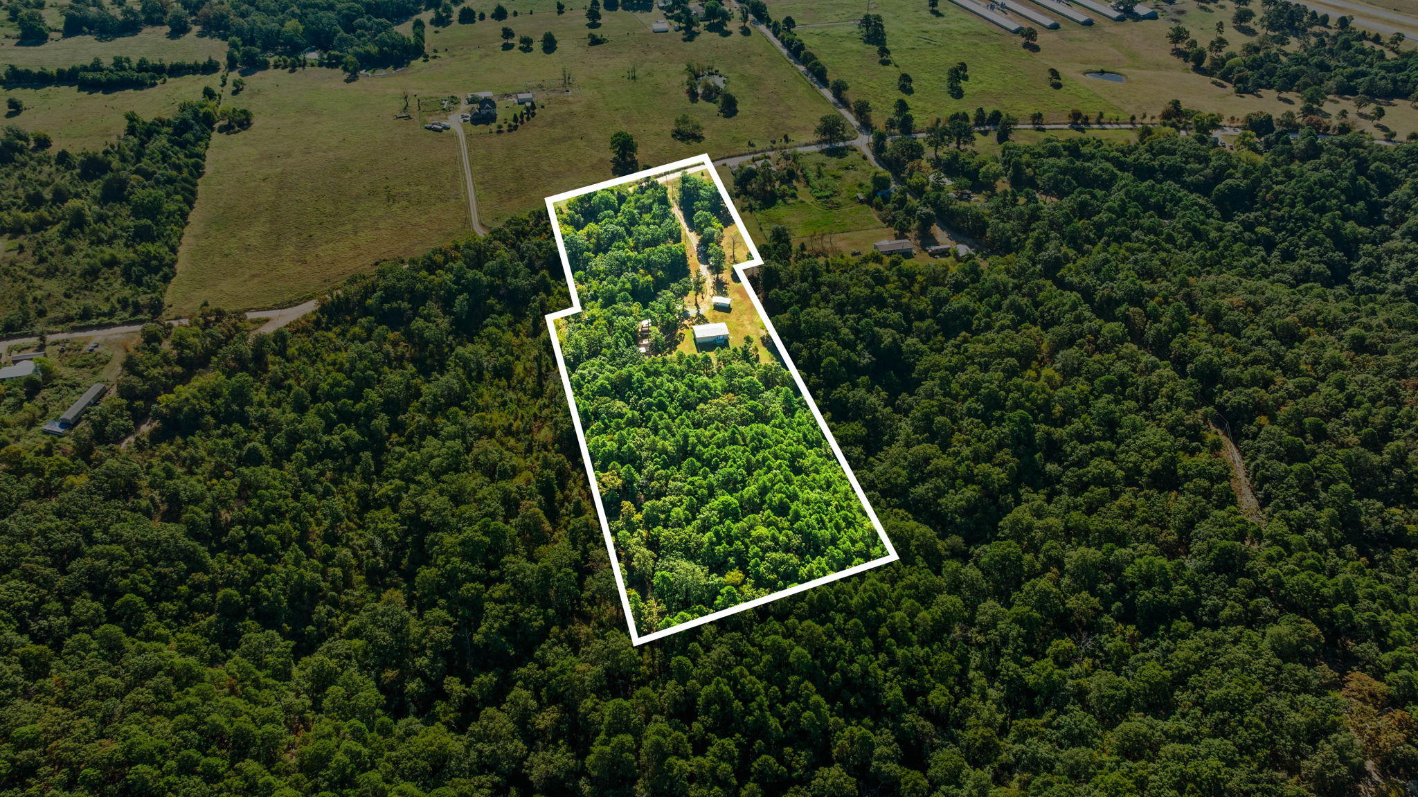 57443 667th Colcord, OK 74338 - Photo 43 of 51 Expansive wooded parcel with visible structures and cleared areas
