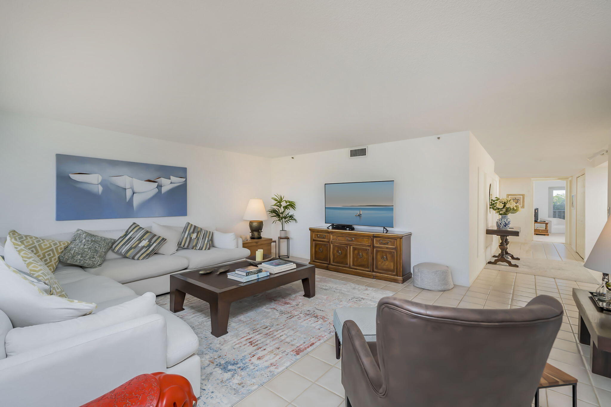 4301 North Ocean Boulevard, Unit A206 Boca Raton, FL 33431 - Photo 12 of 37 a living room with furniture and a couch