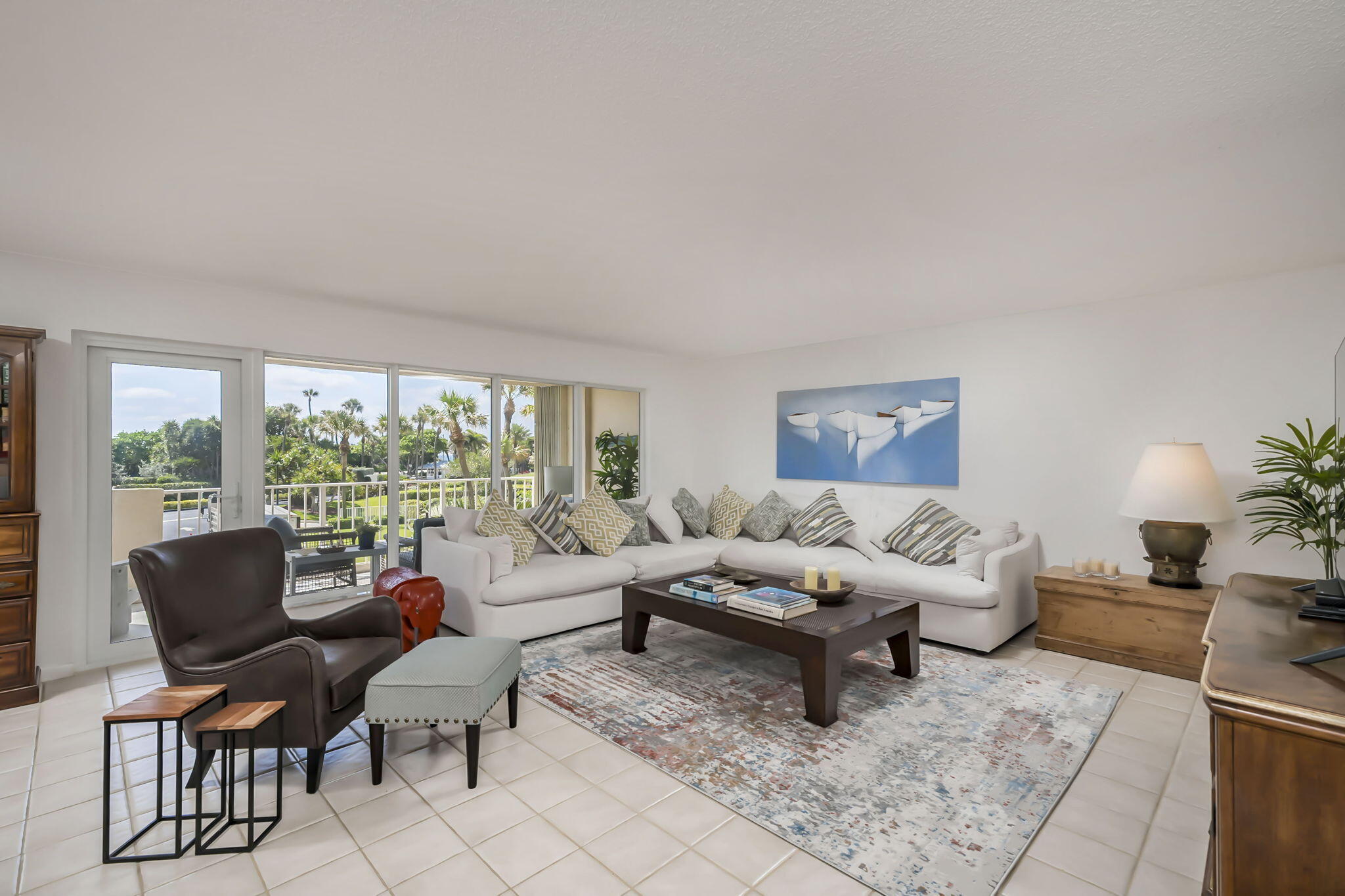 4301 North Ocean Boulevard, Unit A206 Boca Raton, FL 33431 - Photo 2 of 37 a living room with furniture and a large window