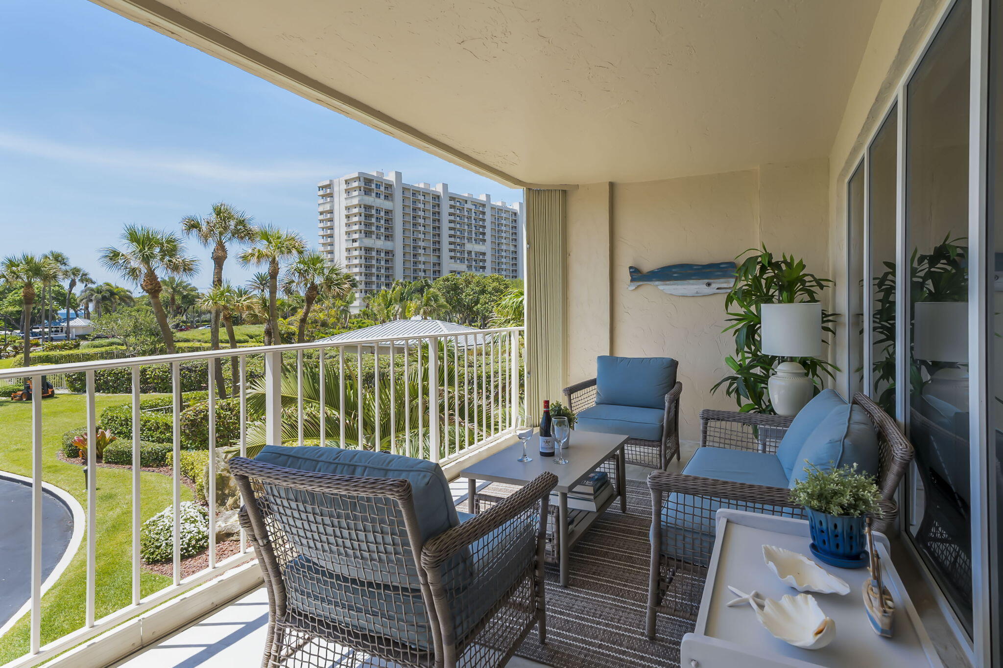 4301 North Ocean Boulevard, Unit A206 Boca Raton, FL 33431 - Photo 29 of 37 a view of a balcony with chairs