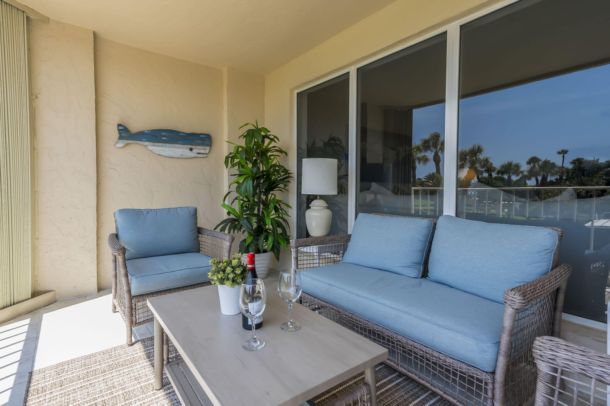 4301 North Ocean Boulevard, Unit A206 Boca Raton, FL 33431 - Photo 30 of 37 a living room with furniture potted plant and a window