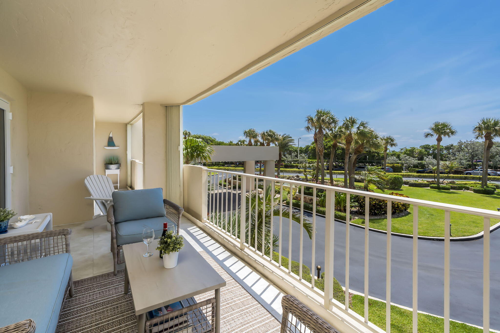 4301 North Ocean Boulevard, Unit A206 Boca Raton, FL 33431 - Photo 31 of 37 a view of a balcony with chairs