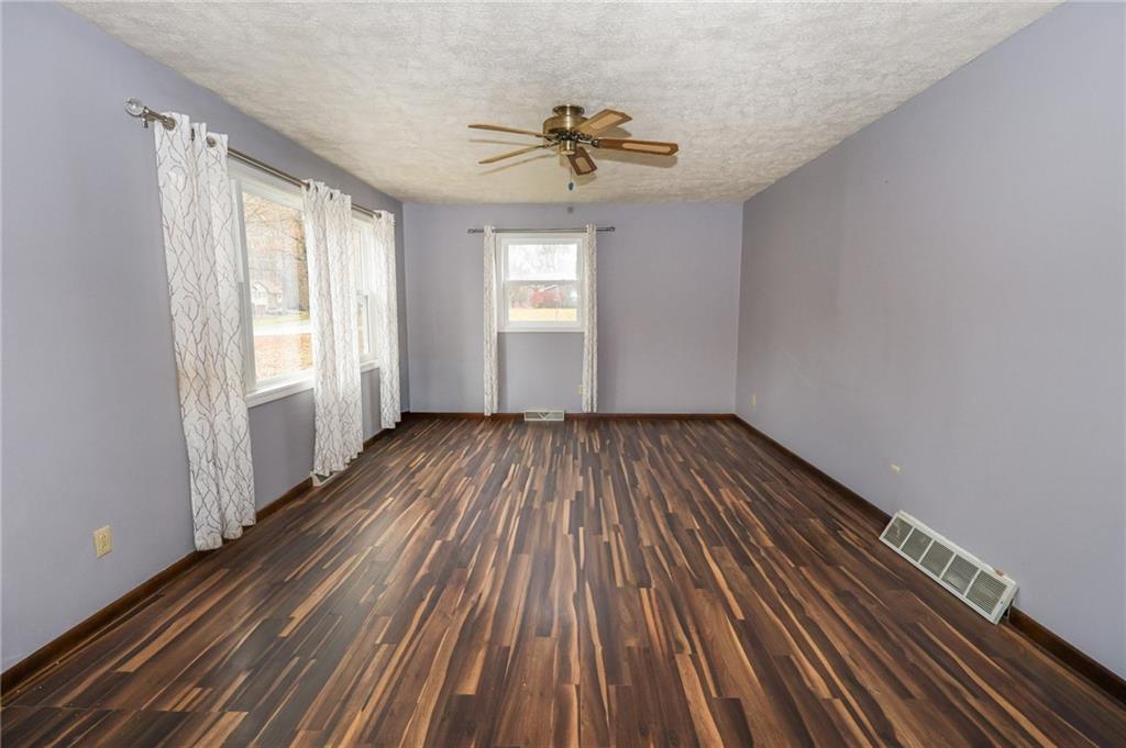 470 North Liberty Road Grove City, PA 16127 - Photo 14 of 34 a view of empty room with wooden floor and fan
