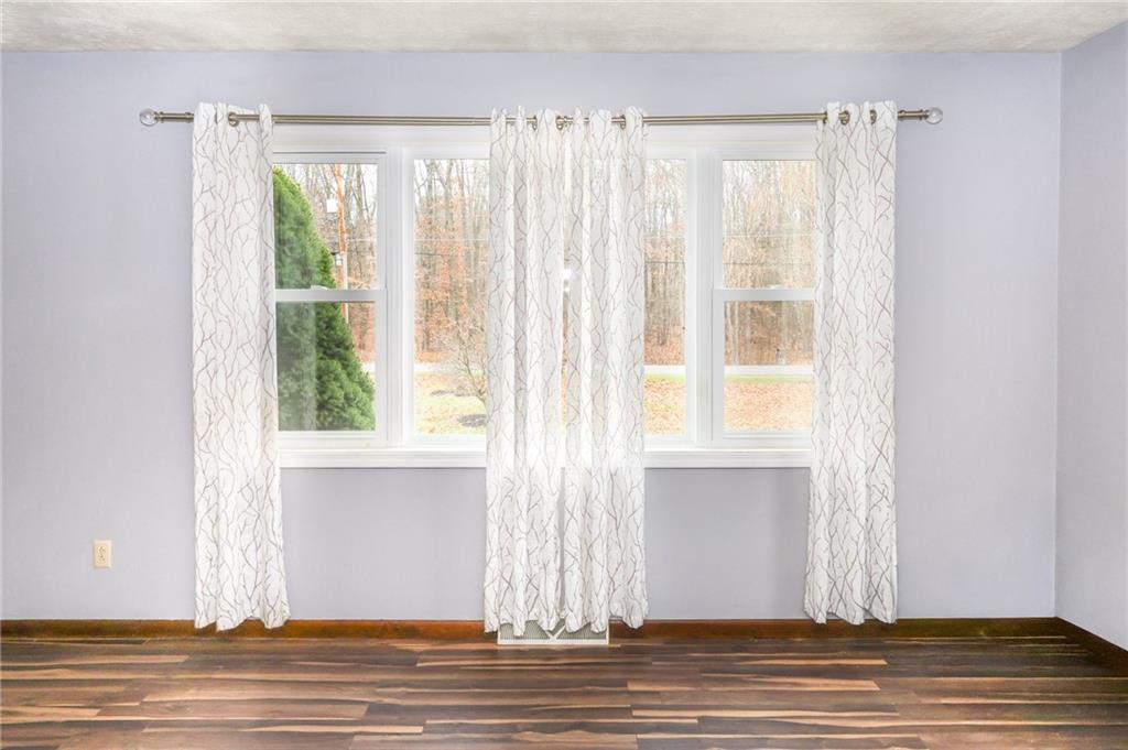 470 North Liberty Road Grove City, PA 16127 - Photo 16 of 34 a view of a livingroom with wooden floor and a window