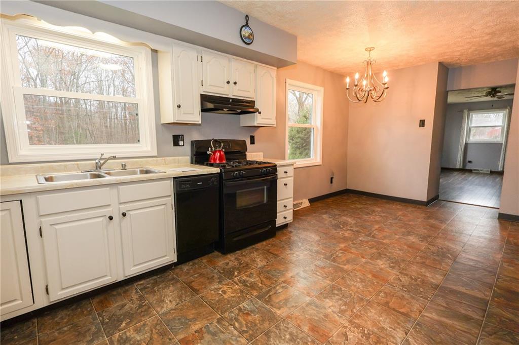 470 North Liberty Road Grove City, PA 16127 - Photo 19 of 34 a kitchen with a sink cabinets and window