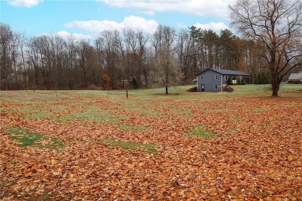 470 North Liberty Road Grove City, PA 16127 - Photo 2 of 34 a house with trees in front of it