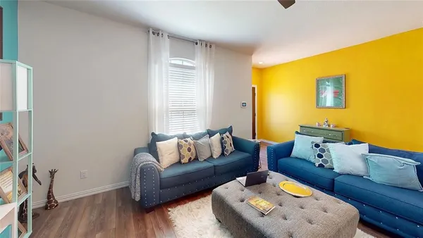 a living room with furniture and a couch