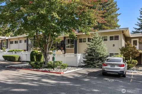 front view of a house with a car parked