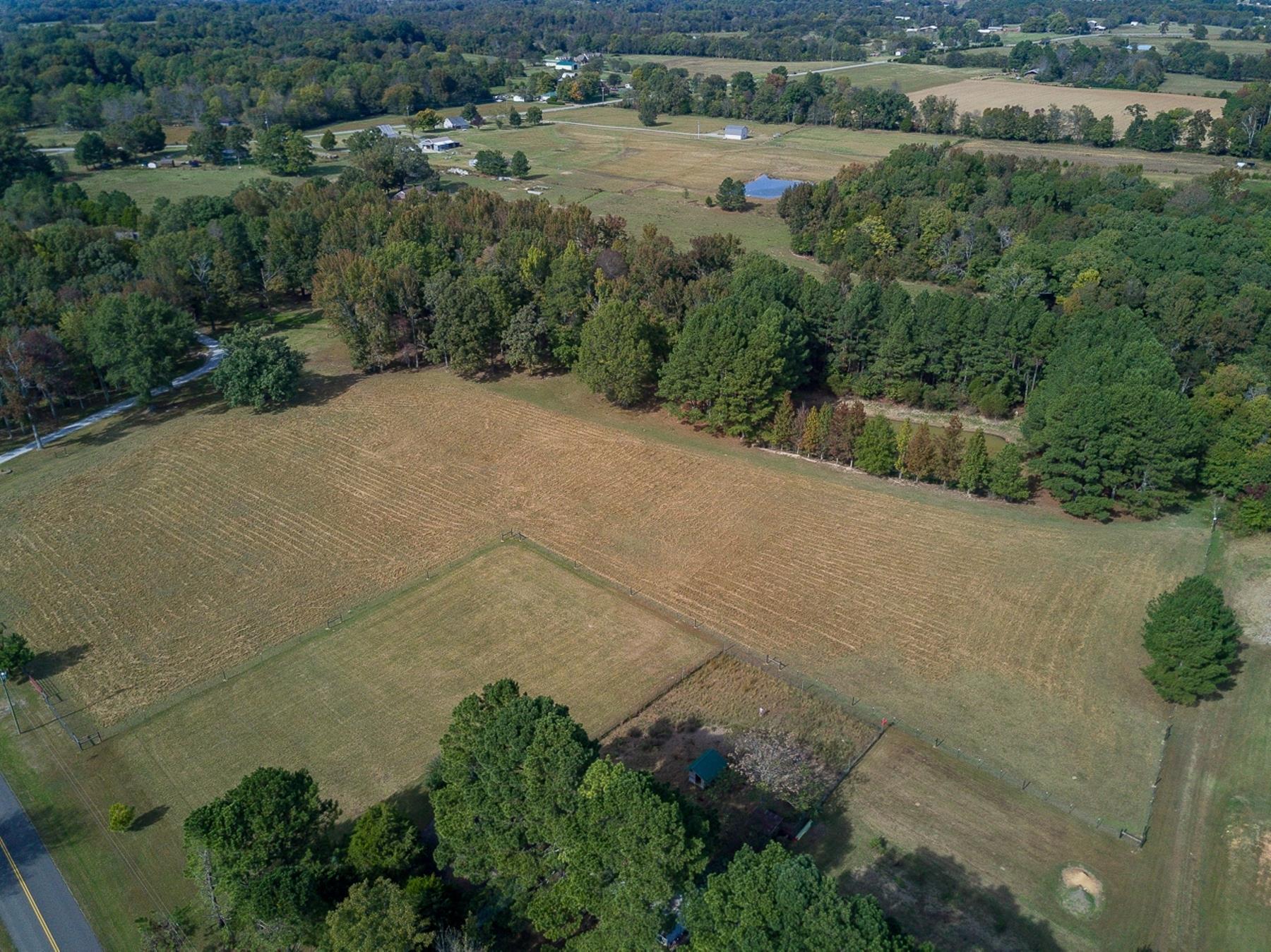 285 Jones Road Taft, TN 38488 - Photo 7 of 7 an aerial view of a house with a yard